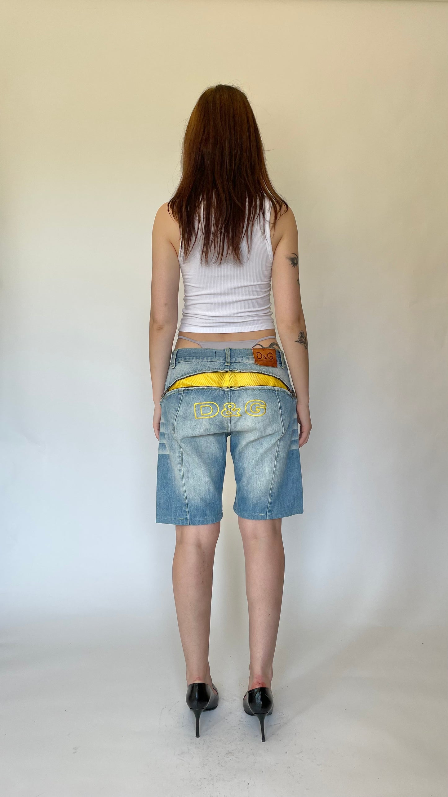 Dolce & Gabbana denim shorts w/ yellow mesh (size 32)